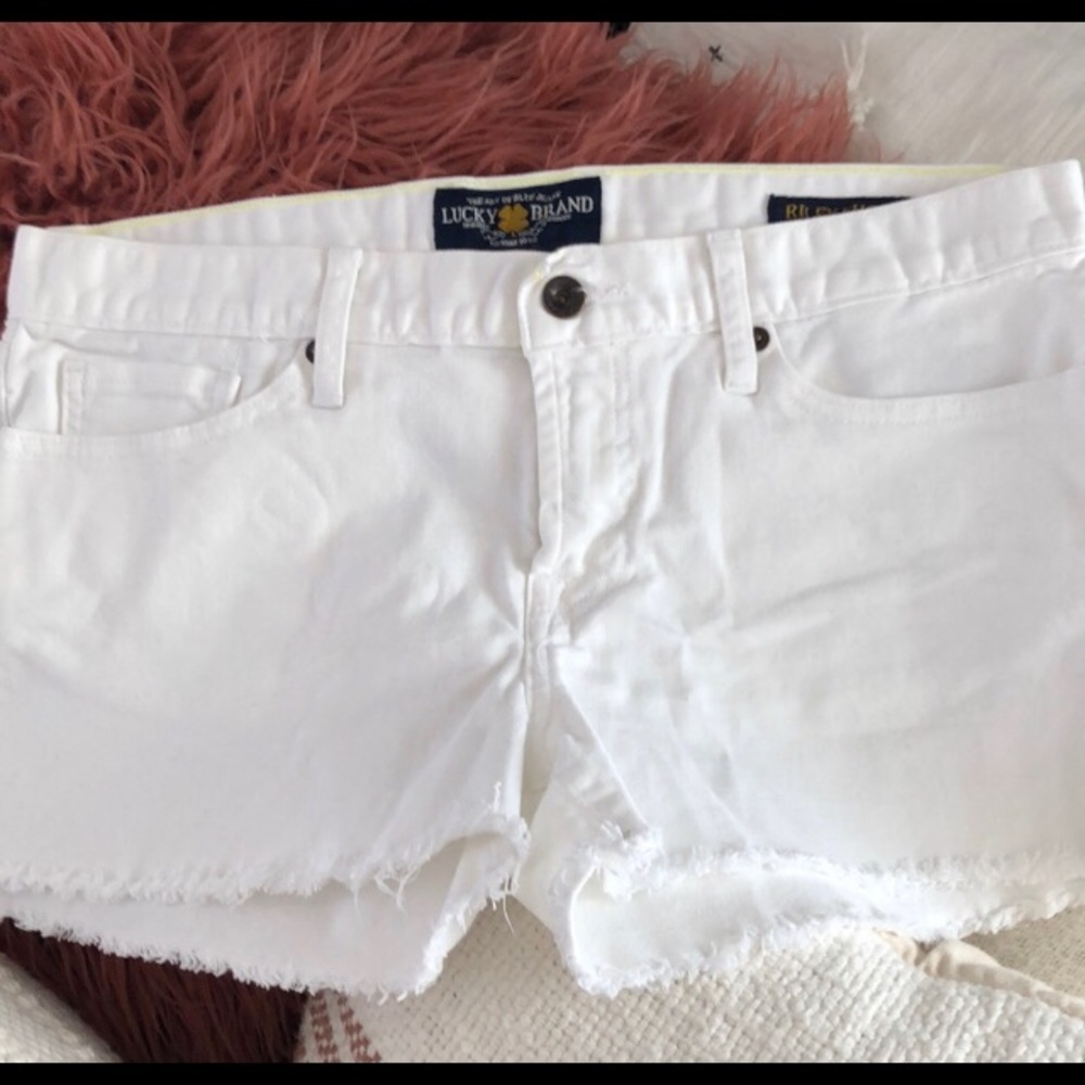 One white and one blue pair of lucky Brand shorts